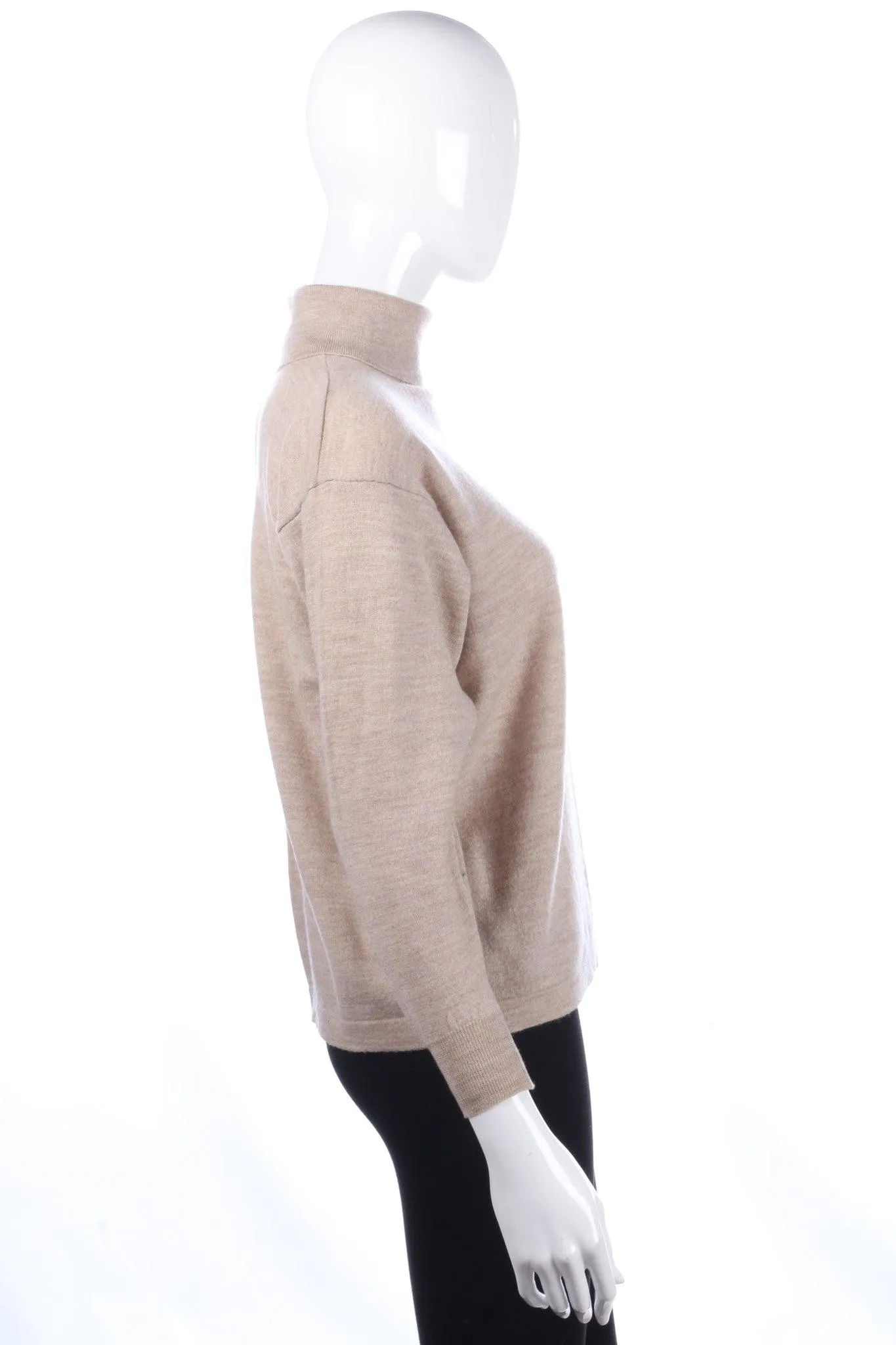 Light roll neck jumper size 12/14