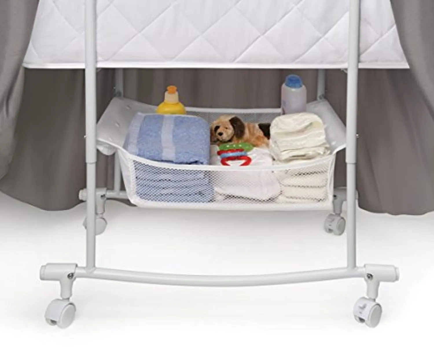 Oval Rocking Baby Bassinet with Bedding, Storage, and Pad